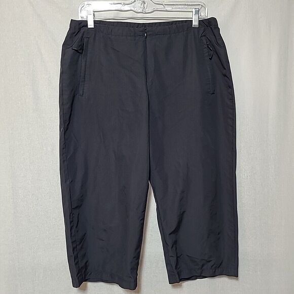 Nike Capri Windbreaker Pants Womens Small Zip Front NME 920220 KL4 Black - Picture 1 of 10